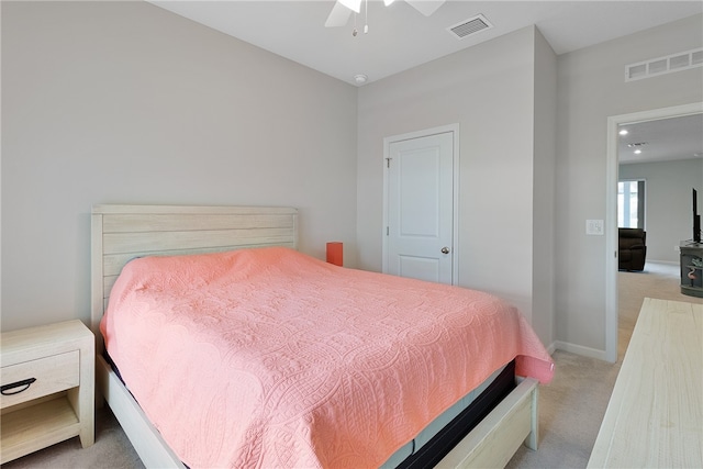 bedroom with light colored carpet and ceiling fan