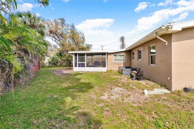 view of yard featuring a sunroom