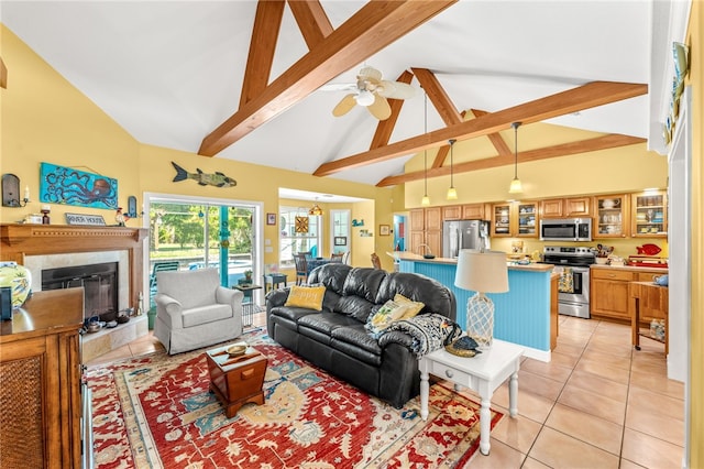 tiled living room featuring beamed ceiling, ceiling fan, high vaulted ceiling, and a high end fireplace