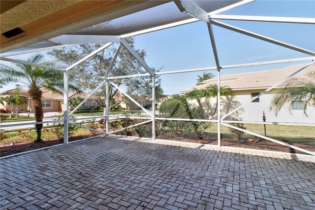 view of patio / terrace with glass enclosure