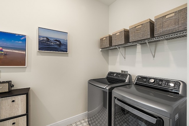 laundry area featuring washing machine and dryer