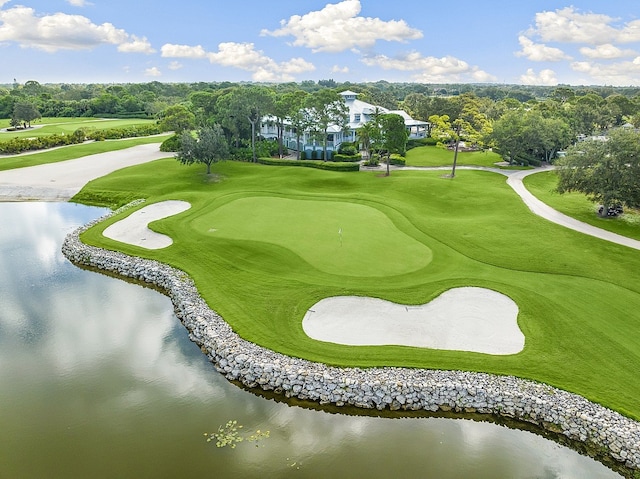 surrounding community featuring a water view