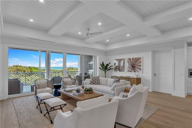 950 Surfsedge Way Unit 205, Vero Beach, FL 32963 - living room featuring light wood-style floors, a ceiling fan, beamed ceiling, and recessed lighting