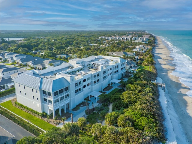 bird's eye view with a water view and a view of the beach