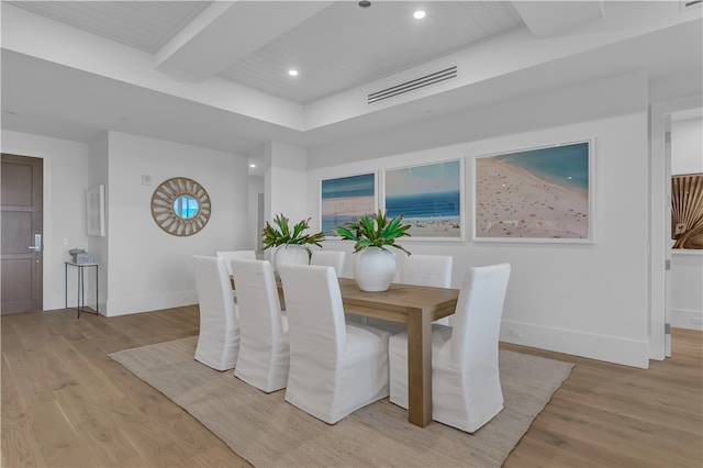 dining space featuring light wood-type flooring