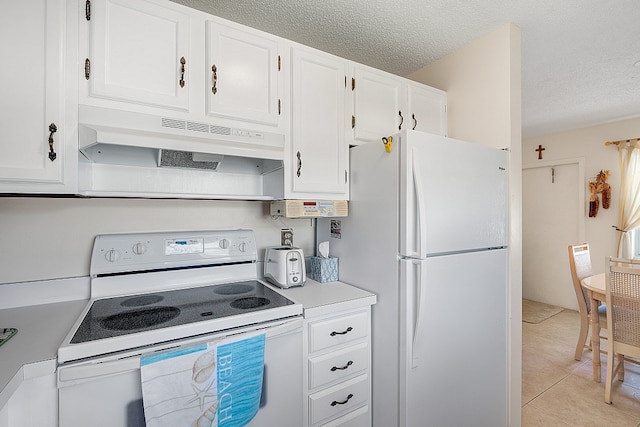 kitchen featuring white cabinetry, exhaust hood, a textured ceiling, and white appliances