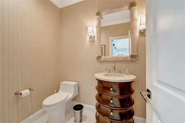 280 Seabreeze Ct, Vero Beach, FL 32963 - half bath with toilet, ornamental molding, vanity, and wallpapered walls