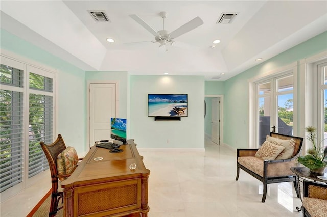 280 Seabreeze Ct, Vero Beach, FL 32963 - office area with a tray ceiling, ceiling fan, baseboards, and visible vents