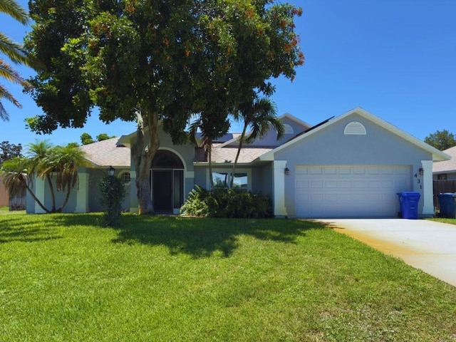 431 Azine Ter, Sebastian, FL 32958 - ranch-style home with stucco siding, a garage, a front yard, and concrete driveway