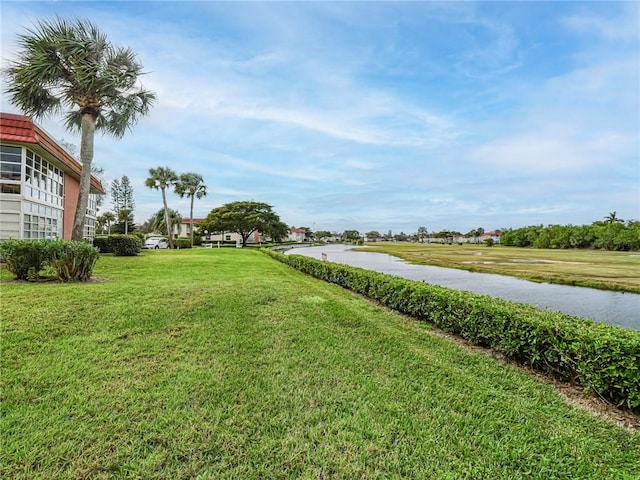 view of yard with a water view