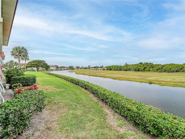 view of yard with a water view