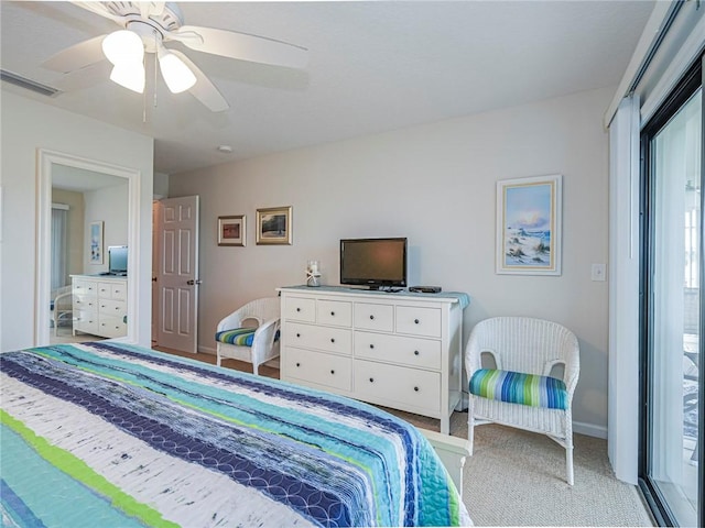 bedroom featuring carpet floors, a ceiling fan, and baseboards