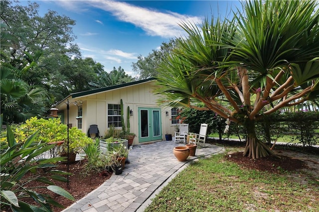 315 62nd Ct SW, Vero Beach, FL 32968 - back of house featuring a patio and french doors