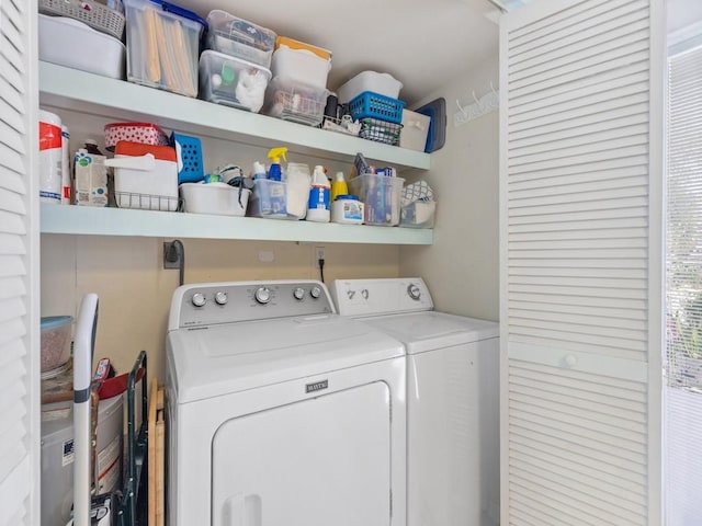 laundry room featuring washer and clothes dryer