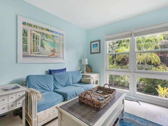 sitting room with tile patterned floors