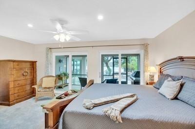 bedroom with carpet floors, access to outside, and ceiling fan