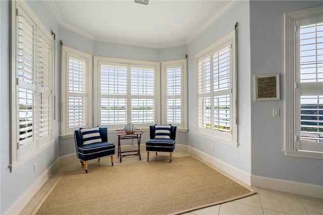 living area featuring light tile patterned floors and ornamental molding