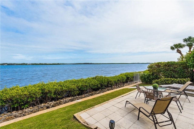 view of patio / terrace with a water view