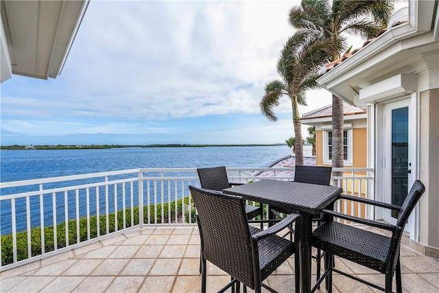 balcony featuring a water view