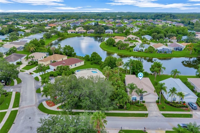 drone / aerial view with a water view