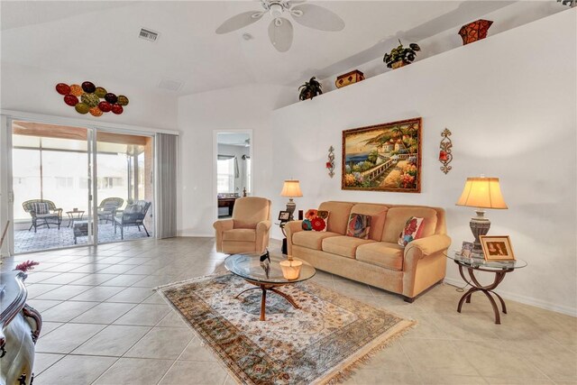 tiled living room with ceiling fan