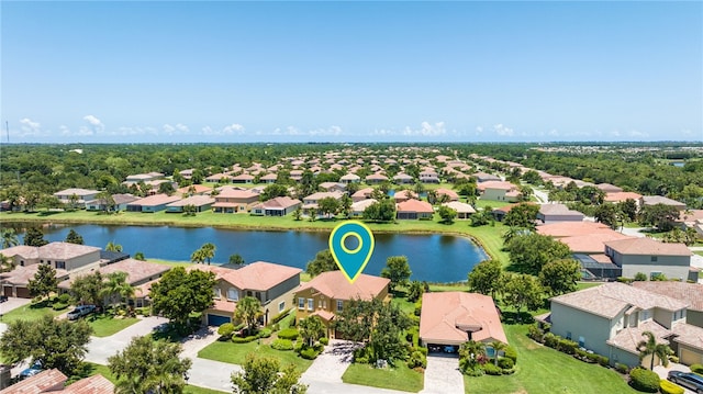 drone / aerial view with a water view