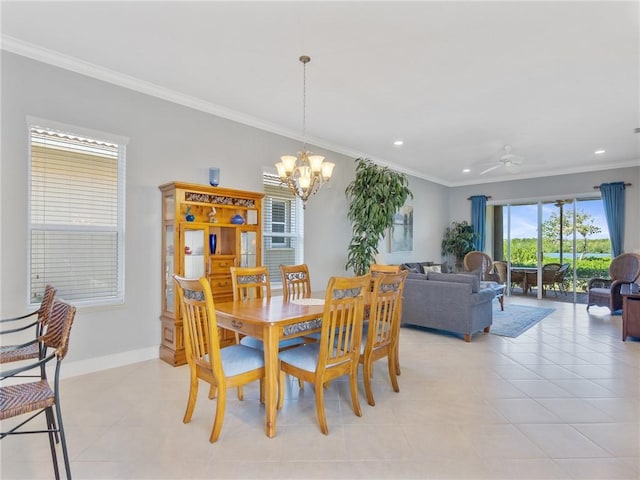 dining room with light tile patterned floors, ceiling fan with notable chandelier, and crown molding