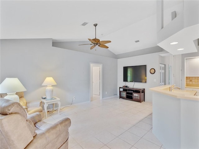 living room featuring ceiling fan, light tile patterned flooring, and lofted ceiling