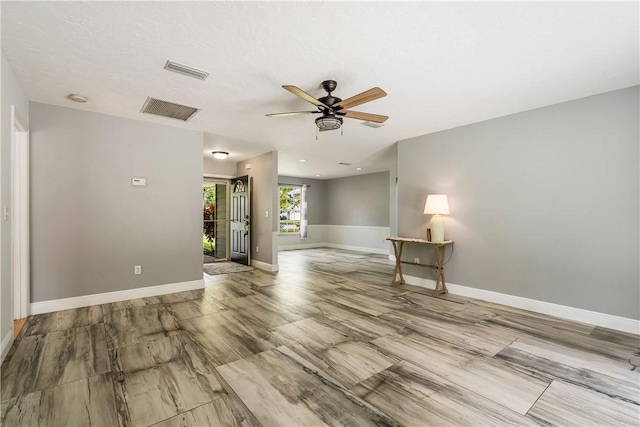 empty room with ceiling fan