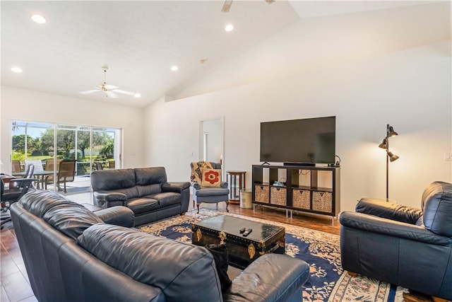 living area with recessed lighting, a ceiling fan, and high vaulted ceiling