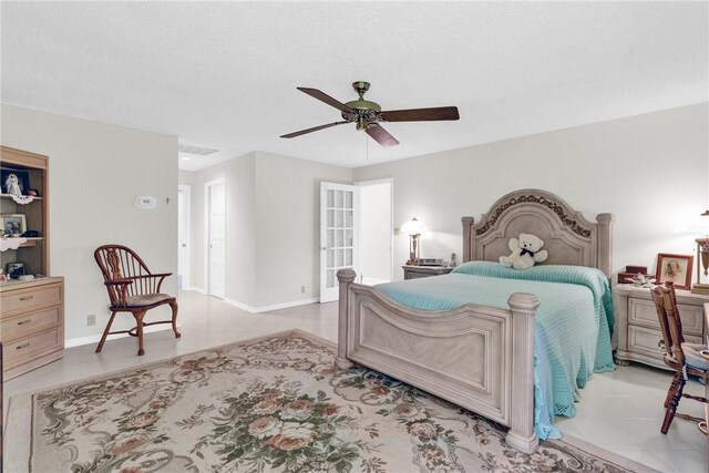 8560 De Haviland Ct, Vero Beach, FL 32968 - tiled bedroom featuring a ceiling fan