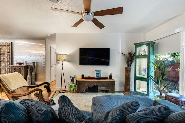 living room featuring ceiling fan