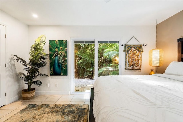 tiled bedroom featuring access to outside