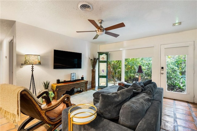 living room featuring ceiling fan