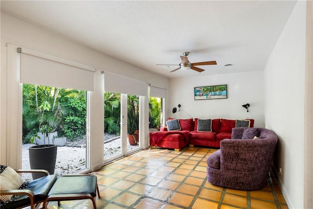 living room featuring ceiling fan