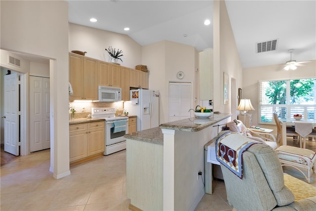 kitchen featuring tasteful backsplash, high vaulted ceiling, ceiling fan, light tile patterned flooring, and white appliances