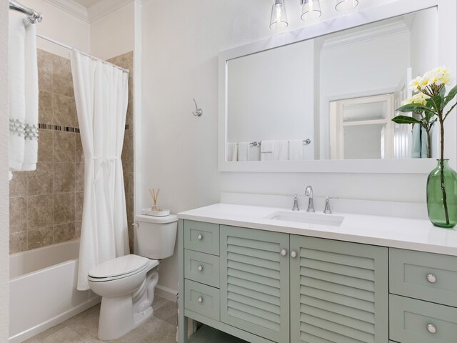 full bathroom featuring toilet, tile patterned floors, vanity, crown molding, and shower / bathtub combination with curtain