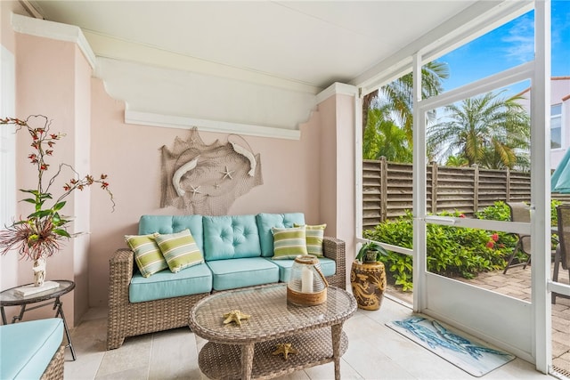 sunroom with beamed ceiling