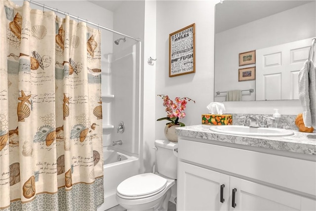 full bathroom featuring shower / bath combo, toilet, and vanity