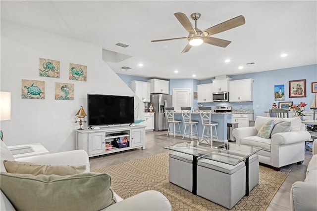 living room with ceiling fan