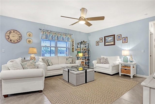 living room featuring ceiling fan and light tile patterned flooring