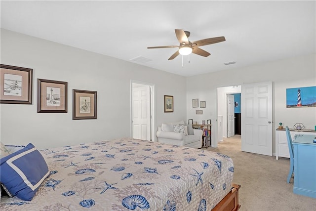 bedroom with ceiling fan and light carpet