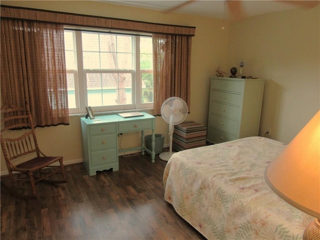 bedroom featuring dark hardwood / wood-style flooring