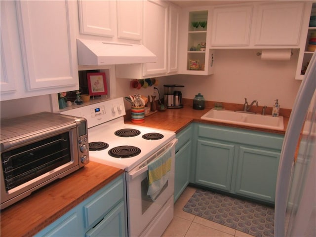 kitchen with white range with electric stovetop, butcher block countertops, sink, white cabinetry, and light tile patterned floors