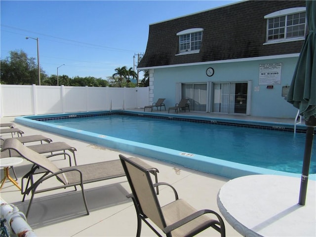 view of pool with a patio area