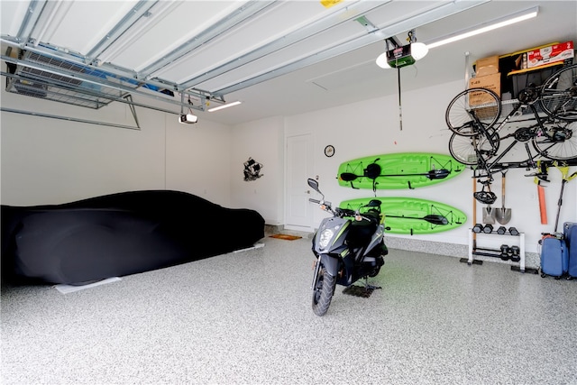 garage featuring a garage door opener