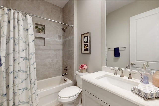 full bathroom with vanity, toilet, and shower / tub combo