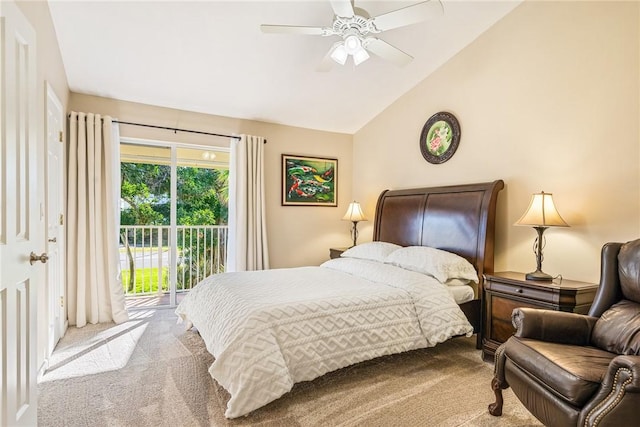 carpeted bedroom with ceiling fan, vaulted ceiling, and access to outside