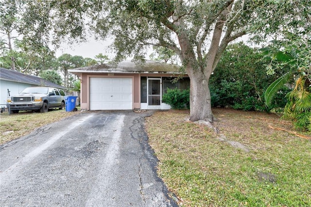 single story home with a garage