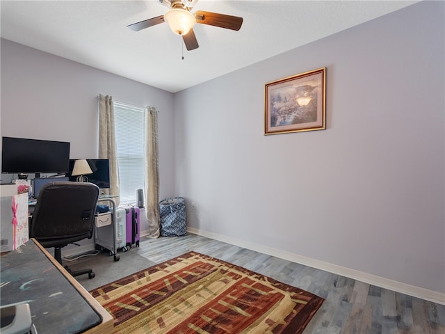 2540 12th Sq SW, Vero Beach, FL 32968 - home office with a ceiling fan and wood finished floors